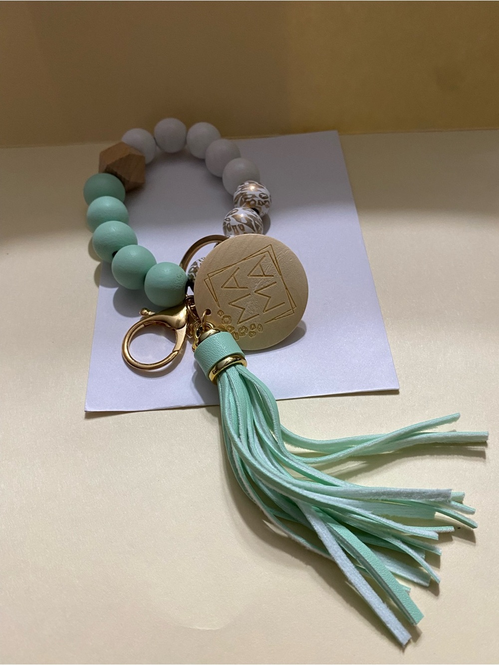 Bagcharm/keychain choose colors  Mint or Grey Leather with Tassel Bead